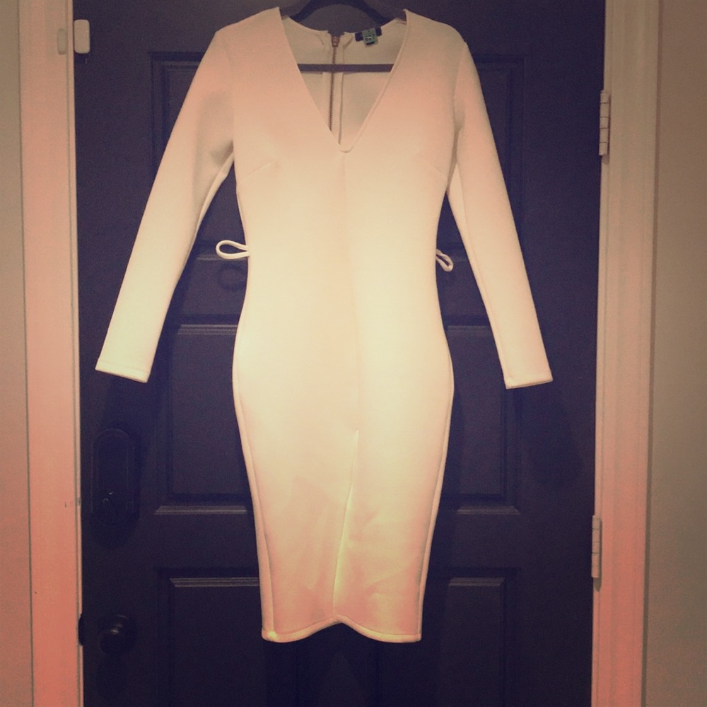 Long sleeve white bandage dress. Super slimming